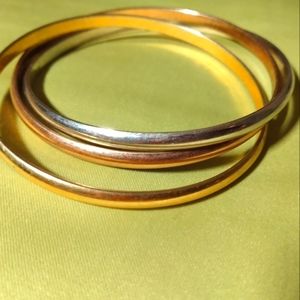 Ladies triple bangle in gold, silver and copper tones